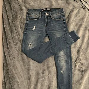 Express mid-rise medium wash blue jean. Size 2. Ankle legging.